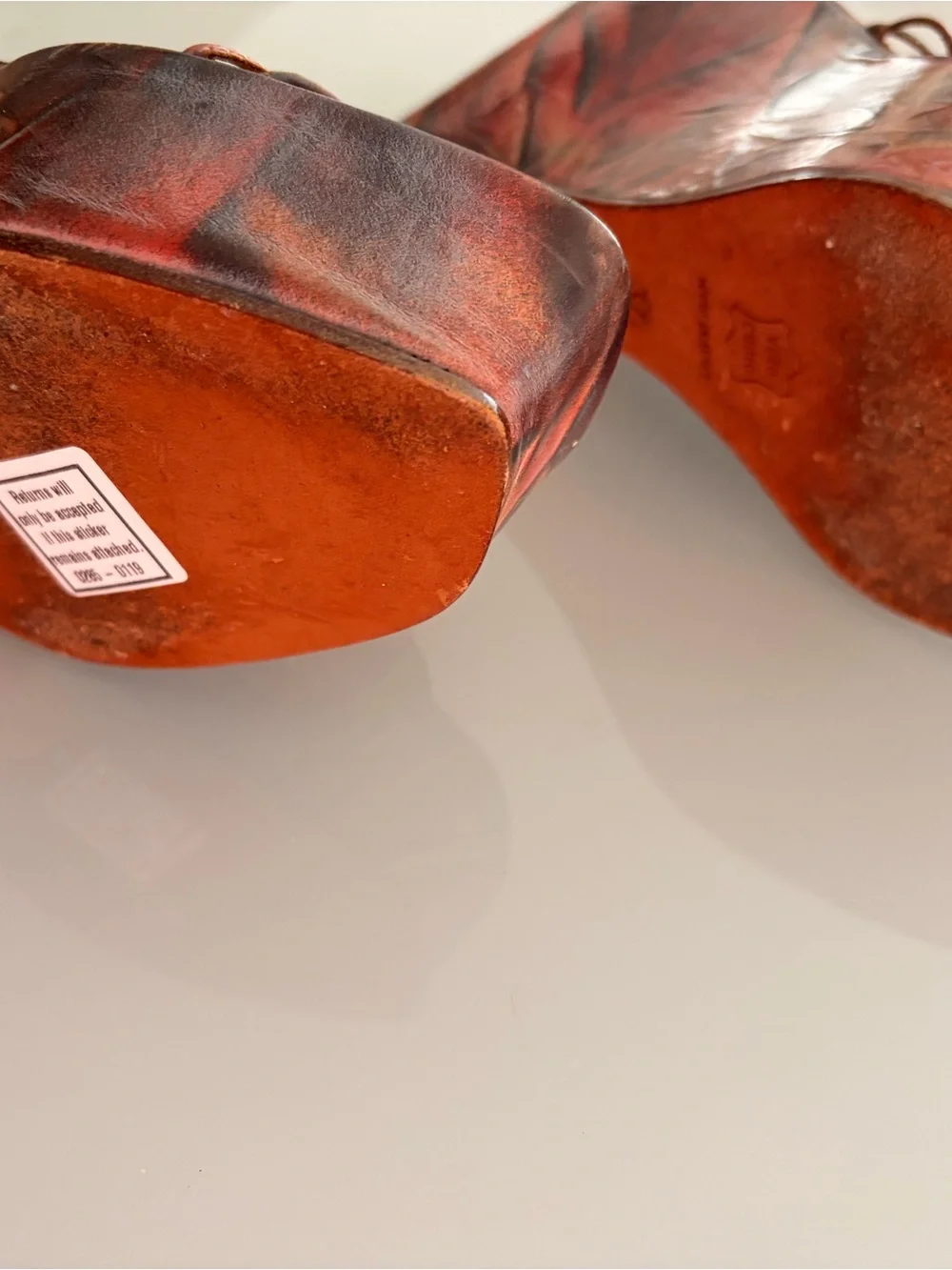Orange Leather Wedge Slides with Decorative Medallion